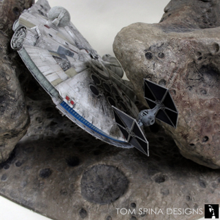 Illustration for article titled I Need This Millennium Falcon Asteroid Field Coffee Table In My Life